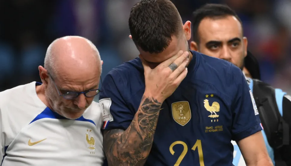 France defender Hernandez limps out of World Cup