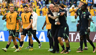 Australia squeeze past Tunisia to revive last 16 hopes