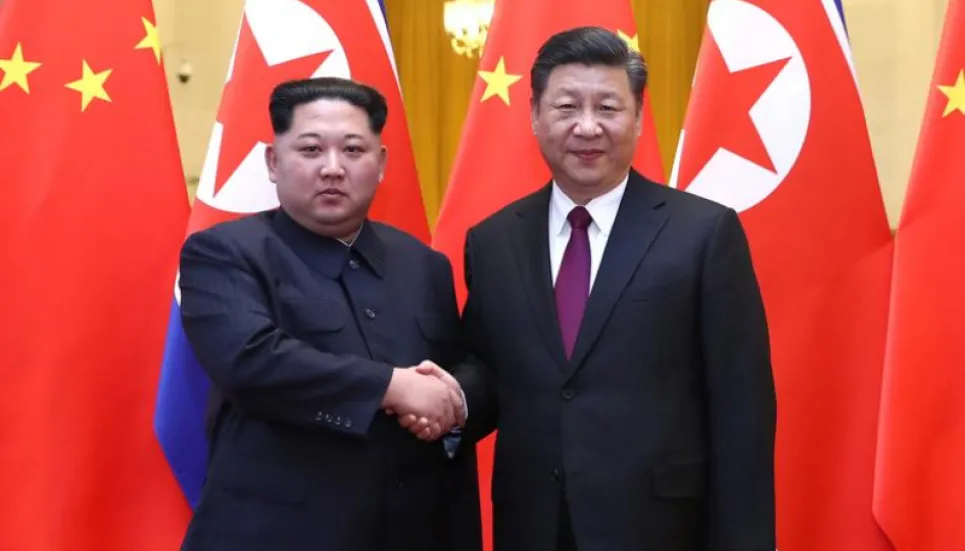 Xi tells Kim, China willing to work with North Korea for world peace