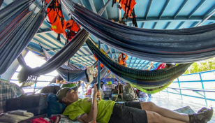 Indigenous people free tourists taken in Peruvian Amazon