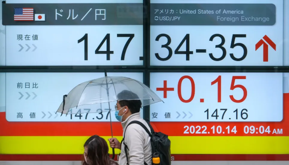 Asian markets drop and dollar rises as inflation, rate fears return