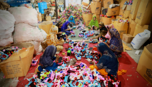 In Pictures: Making a living from plastic toys