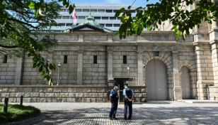 Japan central bank conducts 'rate check' as yen sinks: Reports