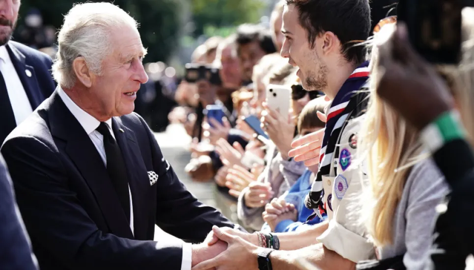 King Charles surprises huge London queue for queen's coffin