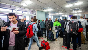 Queues build up at Mongolian border as people flee Russia call-up