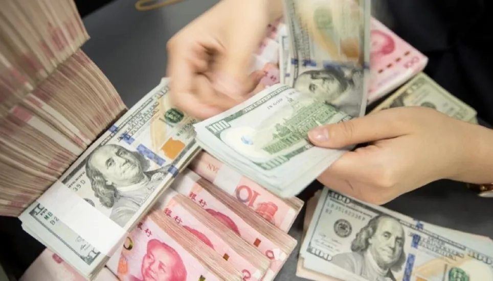 China's offshore yuan hits record low against dollar
