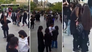 Iran arrests woman for eating out without hijab