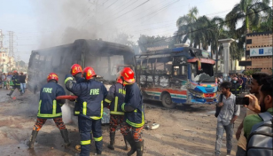 2 buses torched after biker stuck between them dies in Ashulia