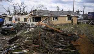 At least 26 dead after tornadoes rake US Midwest, South