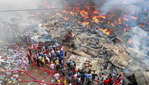 Shahidul, Moinuddin watch their businesses go up in flames