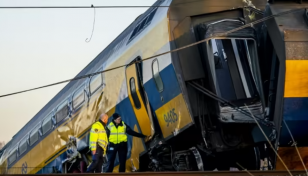 One dead, dozens injured in Dutch rail crash