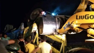 Father, son crushed underneath as truck overturns in Ctg