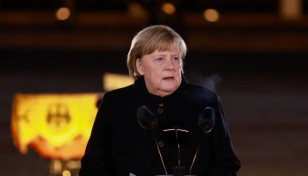 Merkel to get Germany's top honour despite criticism