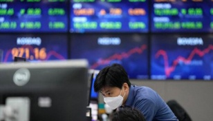 Asian stocks mostly down after mixed session on Wall Street