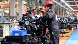 China factory activity cools in April as recovery challenges loom