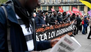 Thousands protest French government’s immigration plans