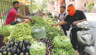 India's central bank holds rates as food prices soar