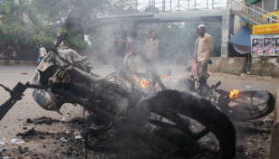 Jamaat-Shibir activists set motorbikes ablaze in Shahbagh