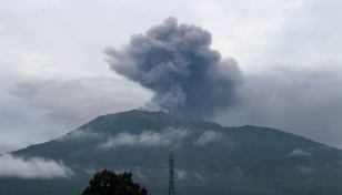 11 dead after Indonesia volcano erupts, 12 still missing