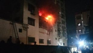 At least 14 killed in India building fire