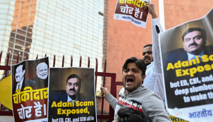 Adani Enterprises shares soar 25% after loan payment pledge