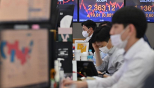 Asian markets drop as traders eye for higher rates