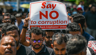 Sri Lanka outlaws strikes as anti-tax protests spread