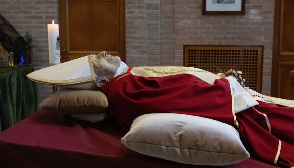 Pope hails 'beloved' Benedict as Vatican releases photos of body