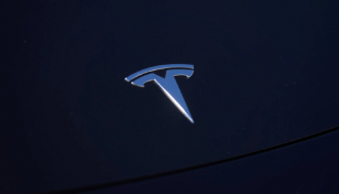 Tesla reports record profits, confirms long-term outlook