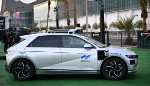 At CES tech mega-show, driverless cars show promise, limitations