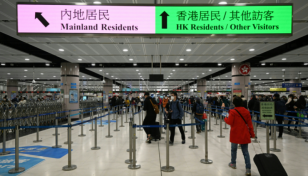 China ends quarantine for overseas travellers