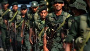 Sri Lanka to cut army by half after financial crisis