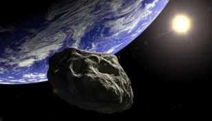 Truck-sized asteroid misses Earth