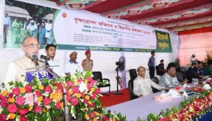 Shahab Uddin for planting more trees to protect environment