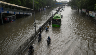 Delhi river reaches record high in monsoon floods