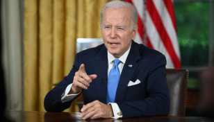 Biden hails averting 'catastrophic' default in Oval Office speech