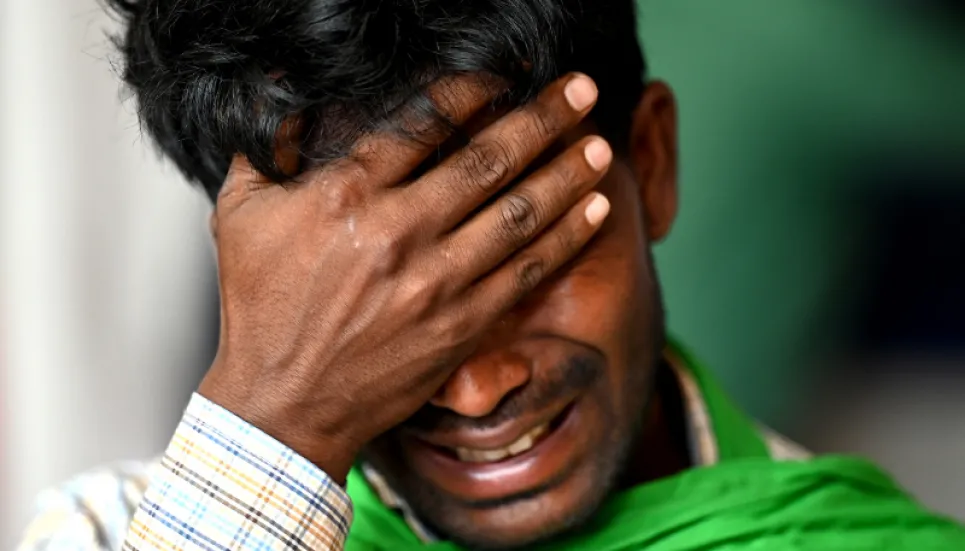 As India grieves train crash, families wait for bodies 