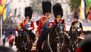 King Charles III saddles up for birthday parade