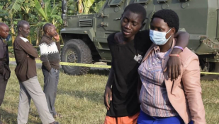 Anxious wait for news after 41 dead in Uganda school attack
