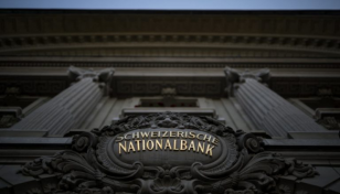 Swiss central bank hikes rate in inflation fight