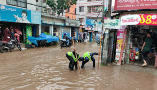 Heavy rains: DNCC's QRT working to handle waterlogging