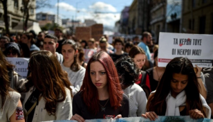 Clashes erupt as tens of thousands protest Greek train tragedy