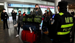 China lifts sweeping visa curbs on foreigners