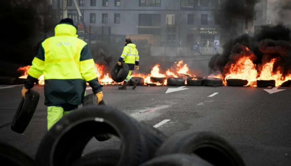 Last-gasp strikes seek to prevent French pension reform