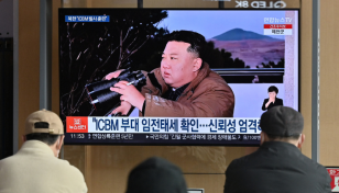 Kim Jong Un and daughter oversee North Korea's ICBM launch