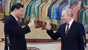 Xi departs Russia after new era summit with Putin