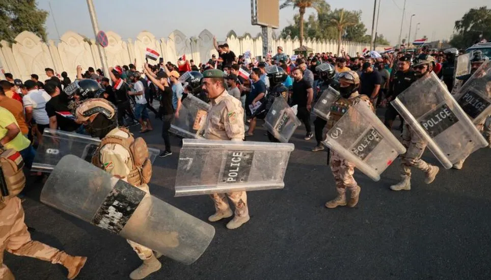 Iraq changes electoral law, sparking opposition anger