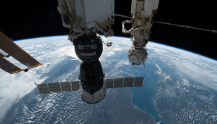 Damaged Russian Soyuz capsule returns to Earth
