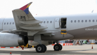 Asiana Airlines bans emergency seats after door-opening accident