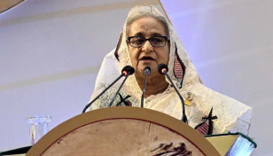 Peaceful democratic atmosphere behind massive dev: PM